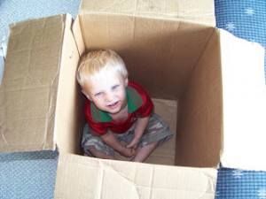 kid in box