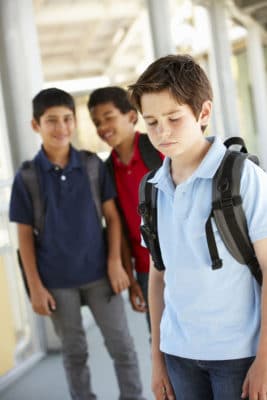 boy being bullied in school