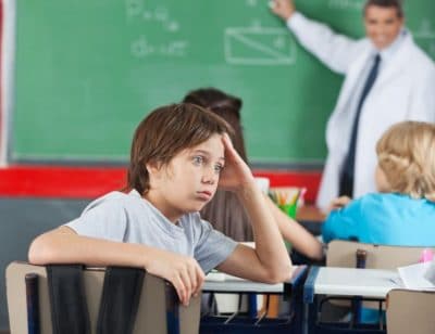 Young boy in class