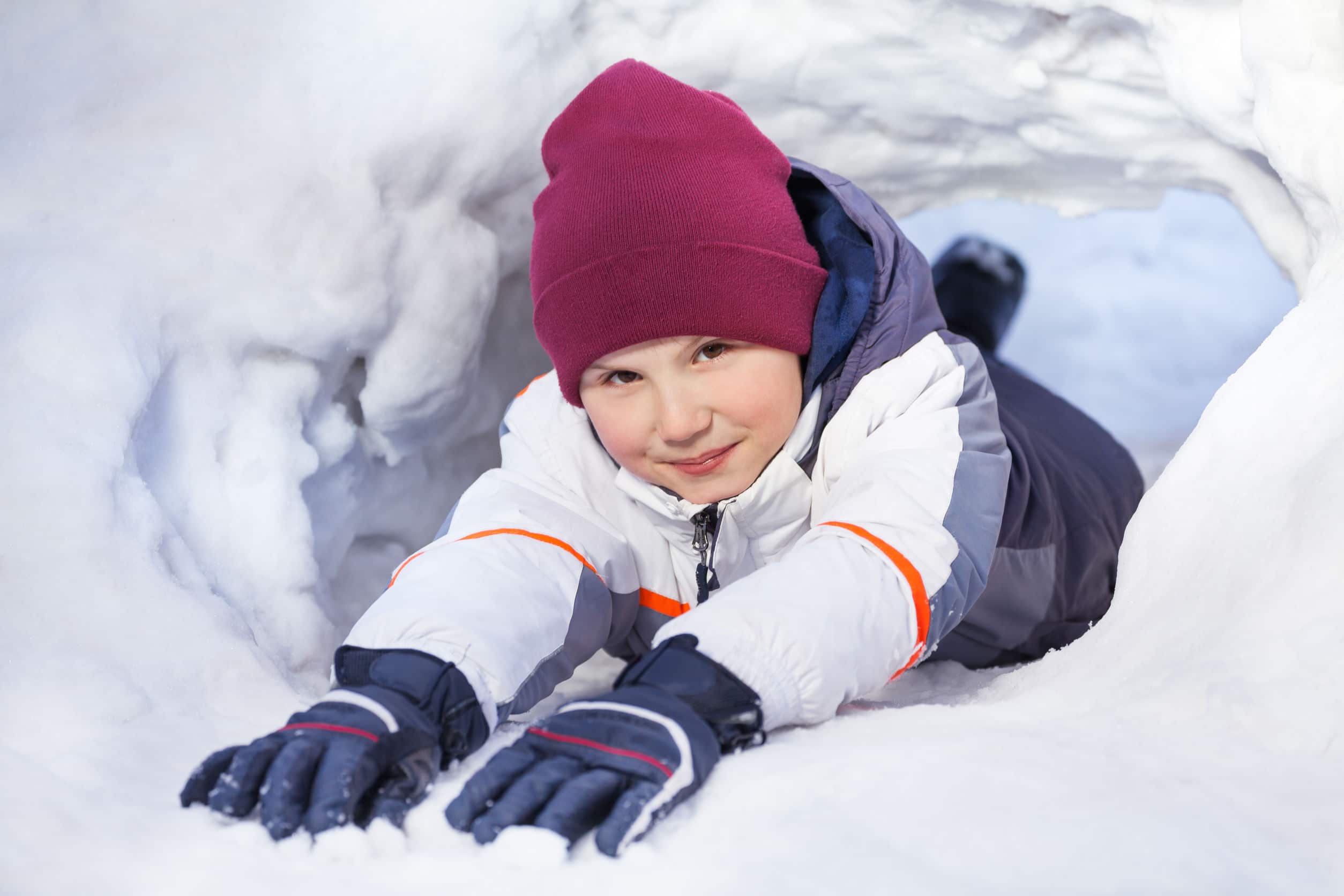 Boy playing in the snow