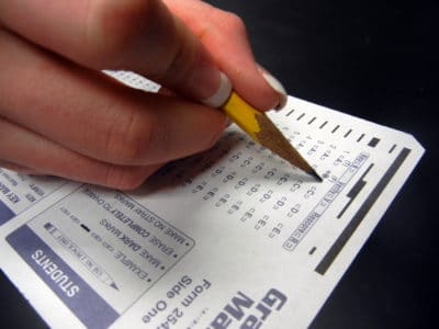 Student filling in standardized test bubbles